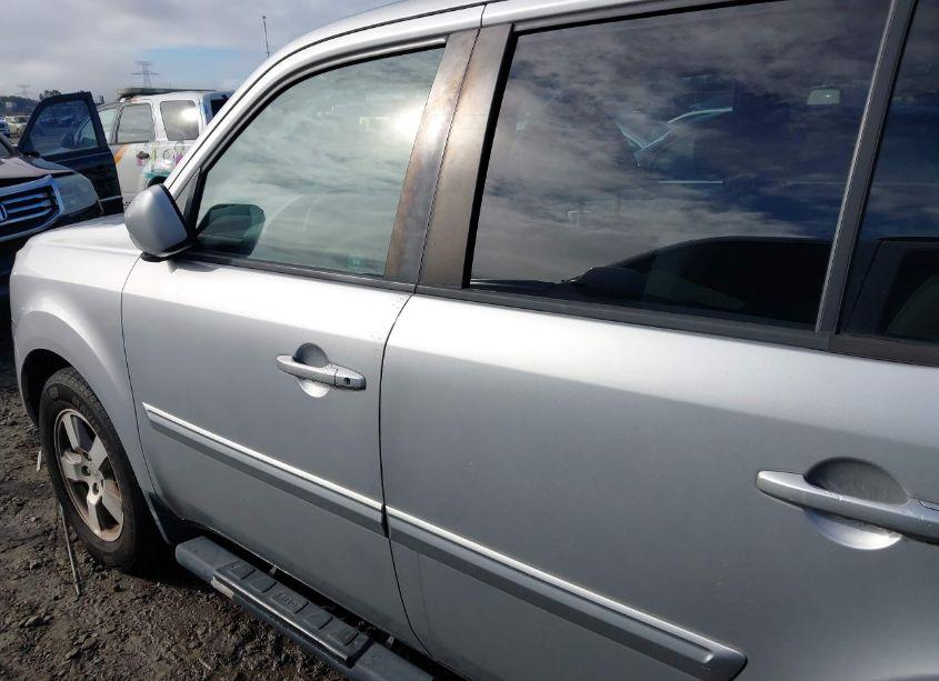 Photo 14 of 2011 Honda Pilot EX-L (VIN 5FNYF4H5XBB046481)