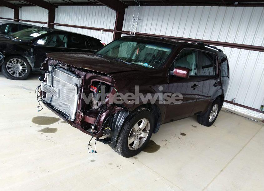 Photo 2 of 2011 Honda Pilot EX-L (VIN 5FNYF4H5XBB047419)