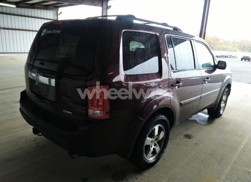Photo 4 of 2011 Honda Pilot EX-L (VIN 5FNYF4H5XBB047419)