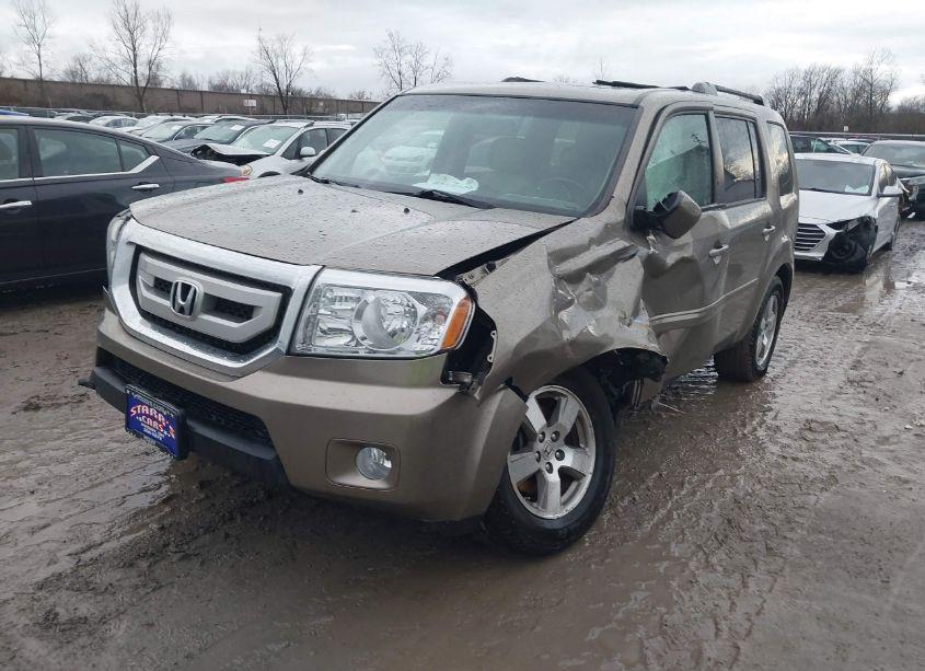 Photo 2 of 2011 Honda Pilot EX-L (VIN 5FNYF4H5XBB072868)