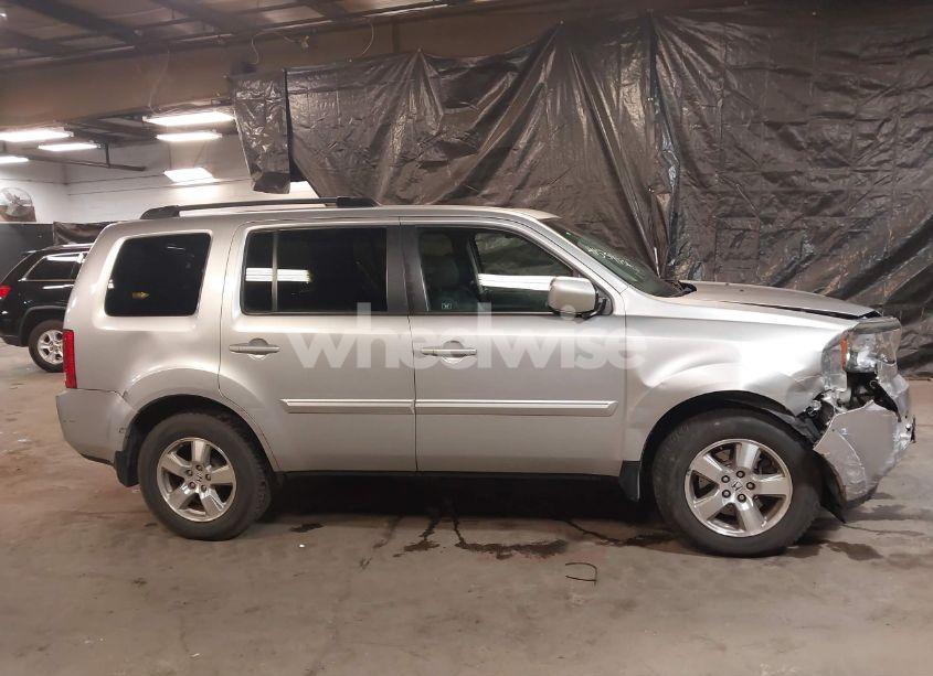 Photo 13 of 2011 Honda Pilot EX-L (VIN 5FNYF4H5XBB104301)
