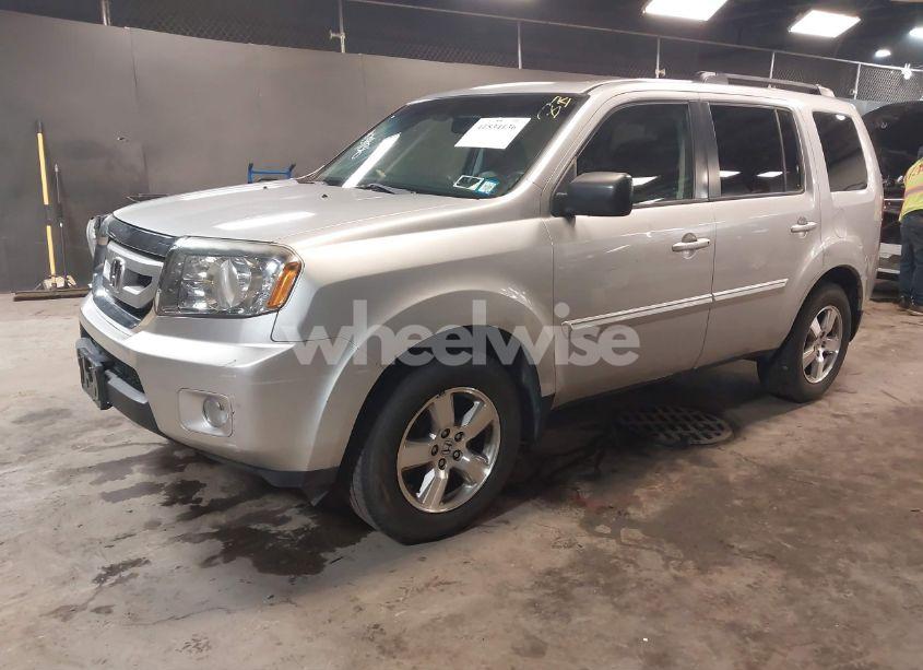 Photo 2 of 2011 Honda Pilot EX-L (VIN 5FNYF4H5XBB104301)