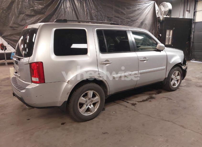 Photo 4 of 2011 Honda Pilot EX-L (VIN 5FNYF4H5XBB104301)