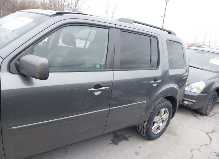 Photo 14 of 2011 Honda Pilot EX-L (VIN 5FNYF4H5XBB104931)