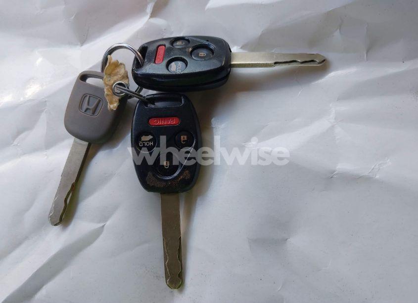 Photo 11 of 2012 Honda Pilot EX-L (VIN 5FNYF4H5XCB027575)