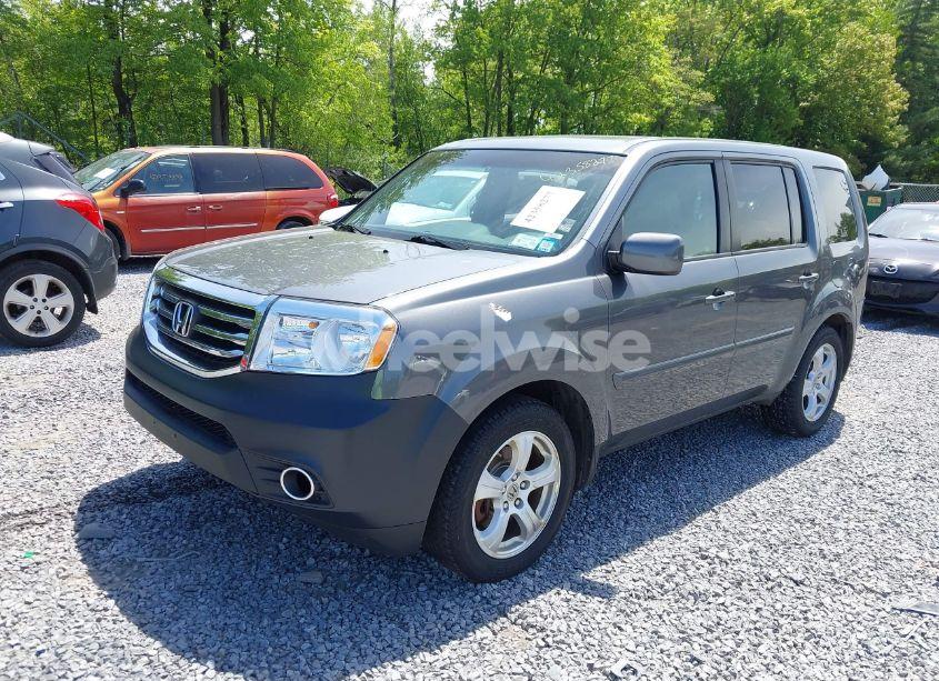 Photo 2 of 2012 Honda Pilot EX-L (VIN 5FNYF4H5XCB065744)