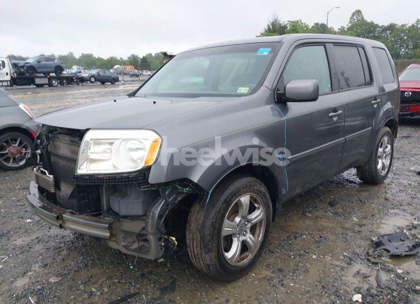 Photo 2 of 2012 Honda Pilot EX-L (VIN 5FNYF4H5XCB080387)