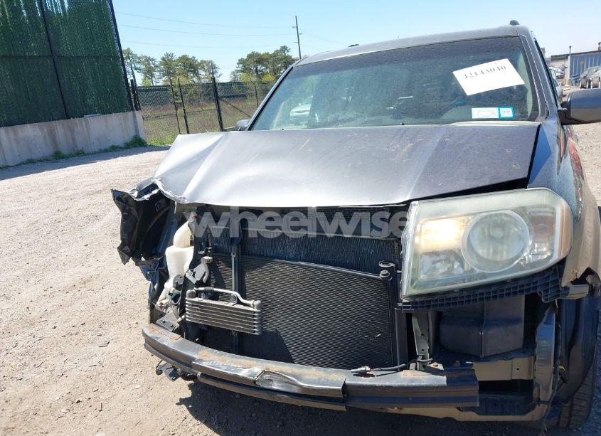 Photo 12 of 2011 Honda Pilot EX-L (VIN 5FNYF4H64BB090811)