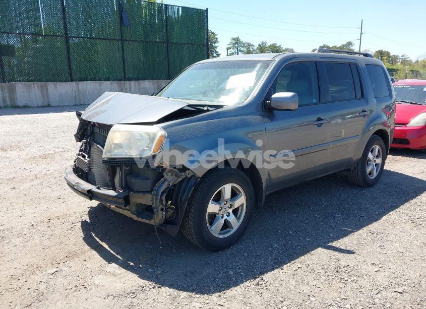 Photo 2 of 2011 Honda Pilot EX-L (VIN 5FNYF4H64BB090811)
