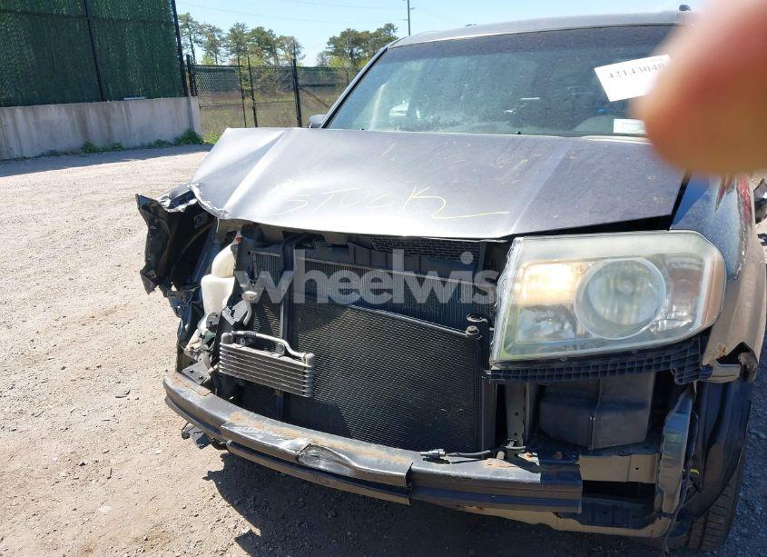 Photo 6 of 2011 Honda Pilot EX-L (VIN 5FNYF4H64BB090811)