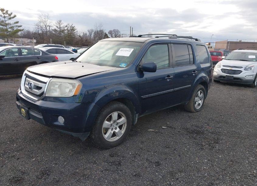 Photo 2 of 2010 Honda Pilot EX-L (VIN 5FNYF4H65AB002475)