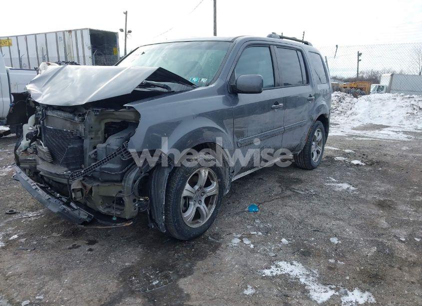 Photo 2 of 2013 Honda Pilot EX-L (VIN 5FNYF4H65DB001749)