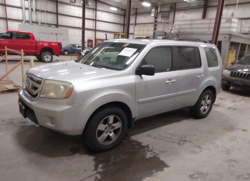 Photo 2 of 2011 Honda Pilot EX-L (VIN 5FNYF4H70BB012924)