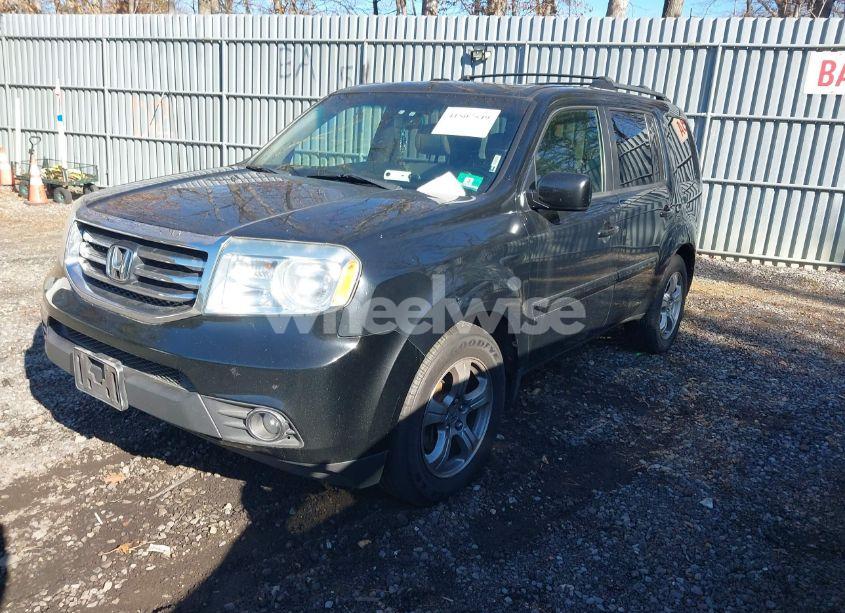 Photo 2 of 2012 Honda Pilot EX-L (VIN 5FNYF4H70CB047738)