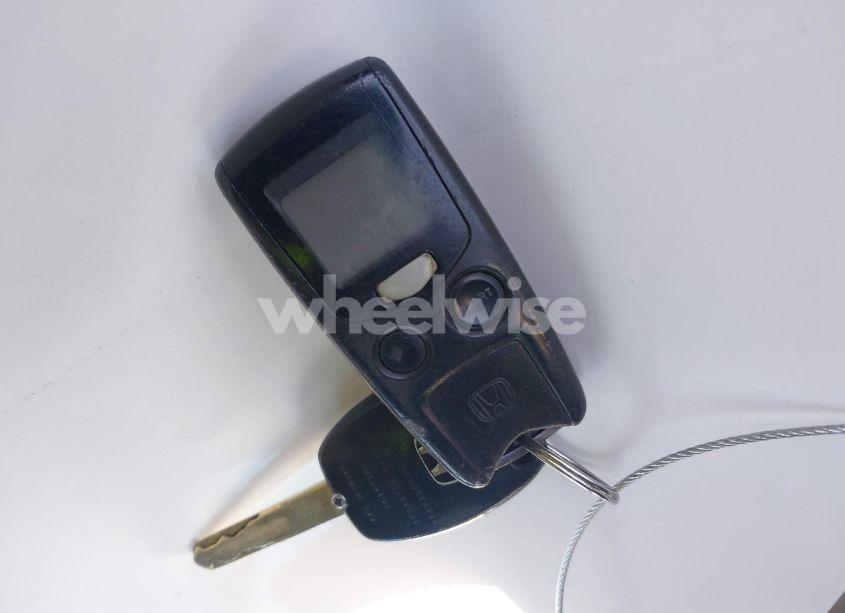 Photo 11 of 2012 Honda Pilot EX-L (VIN 5FNYF4H70CB064961)