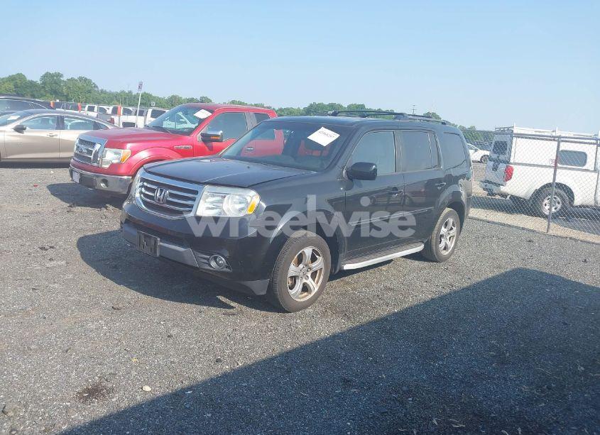 Photo 2 of 2012 Honda Pilot EX-L (VIN 5FNYF4H77CB084401)