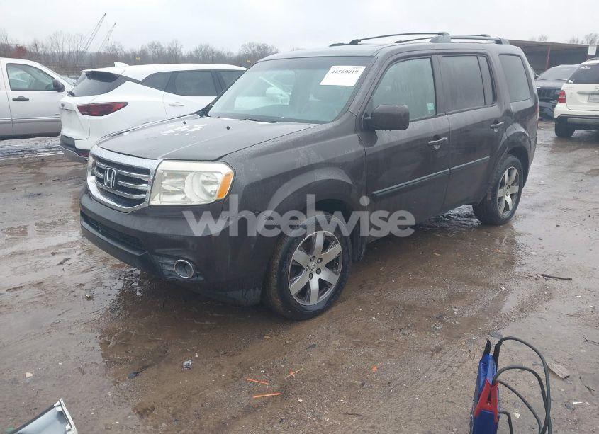 Photo 2 of 2012 Honda Pilot EX-L (VIN 5FNYF4H78CB005673)