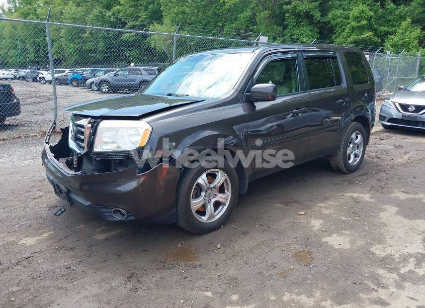 Photo 2 of 2012 Honda Pilot EX-L (VIN 5FNYF4H79CB026760)