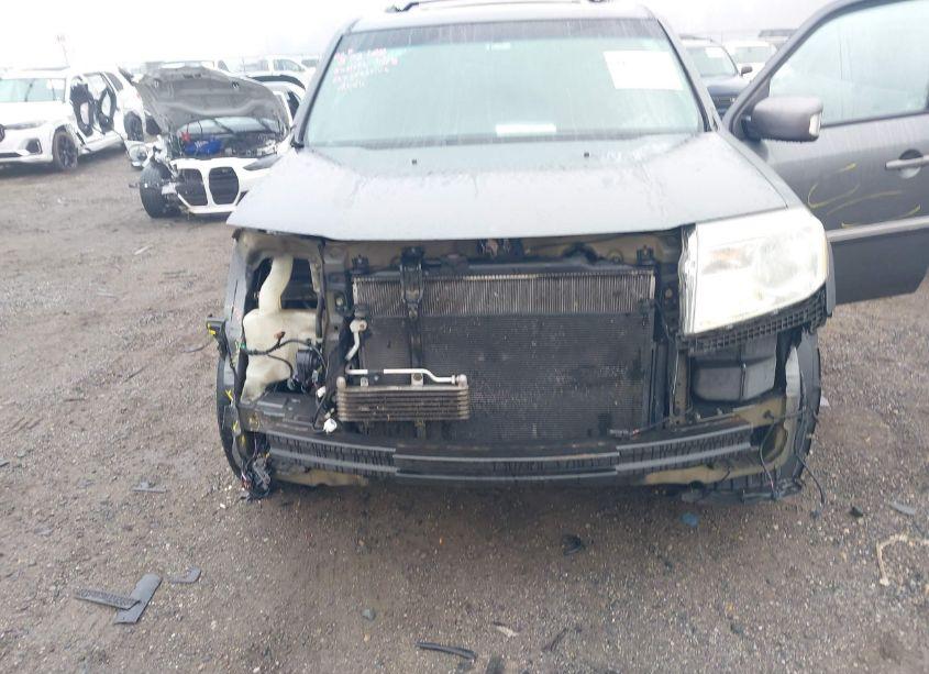 Photo 6 of 2012 Honda Pilot TOURING (VIN 5FNYF4H90CB045599)