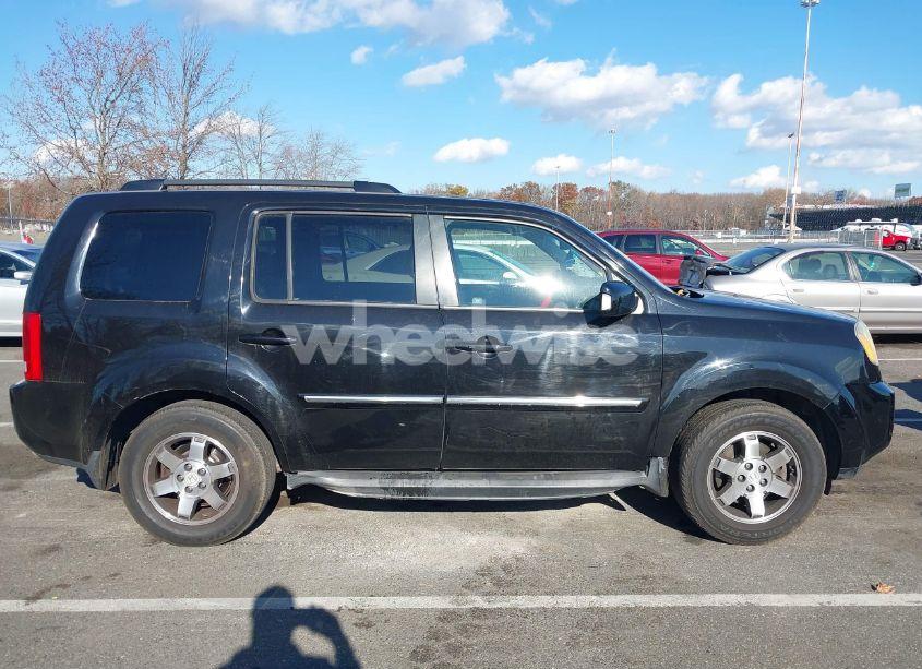 Photo 13 of 2010 Honda Pilot TOURING (VIN 5FNYF4H91AB013435)