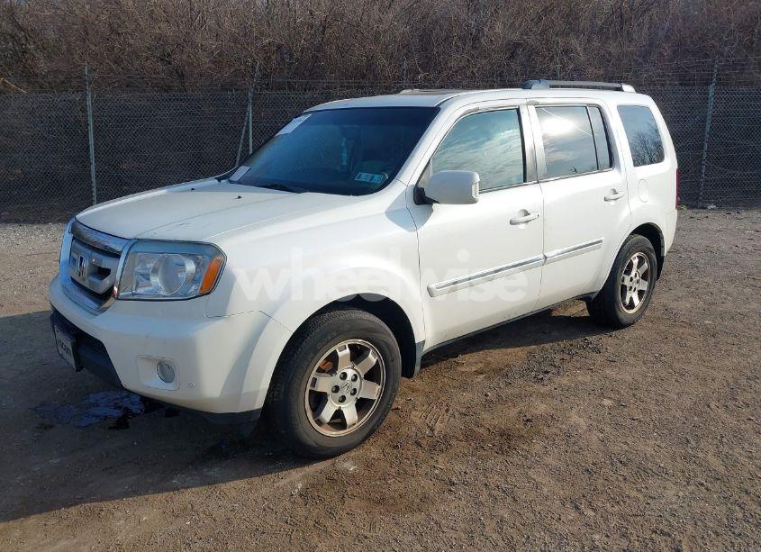 Photo 2 of 2011 Honda Pilot TOURING (VIN 5FNYF4H91BB106537)