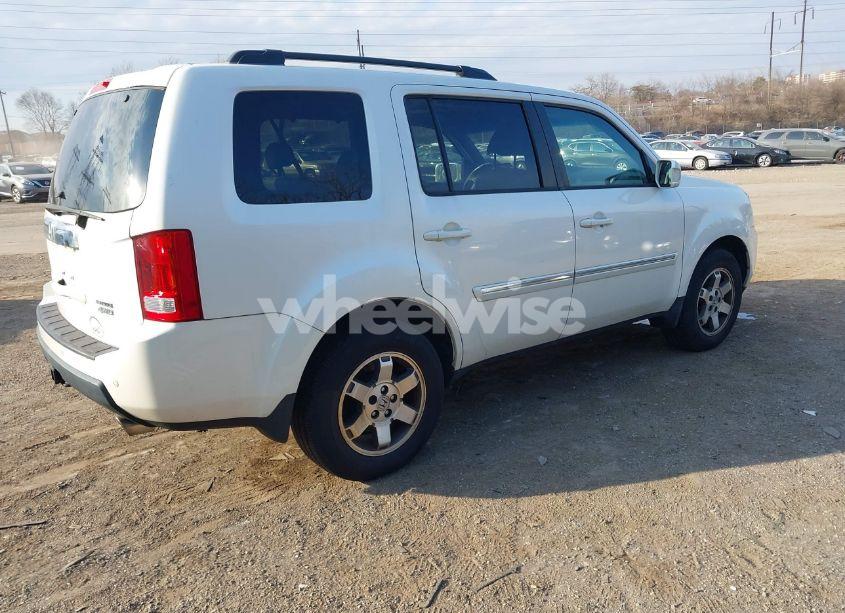 Photo 4 of 2011 Honda Pilot TOURING (VIN 5FNYF4H91BB106537)