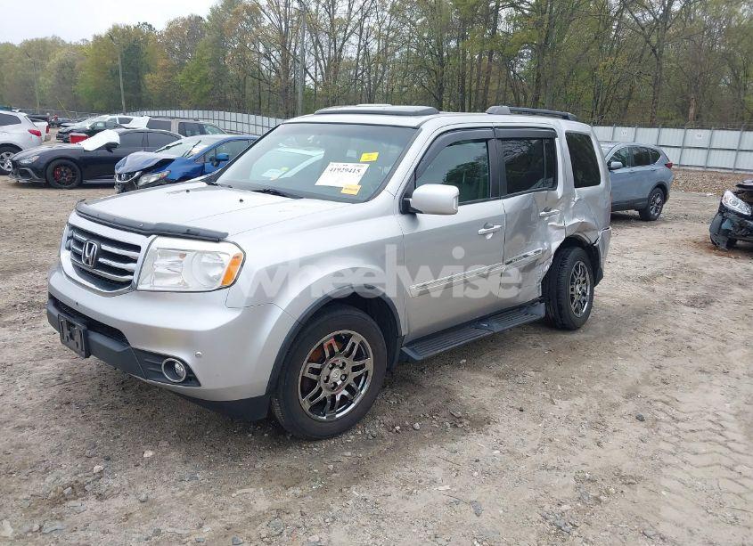 Photo 2 of 2014 Honda Pilot TOURING (VIN 5FNYF4H91EB011934)