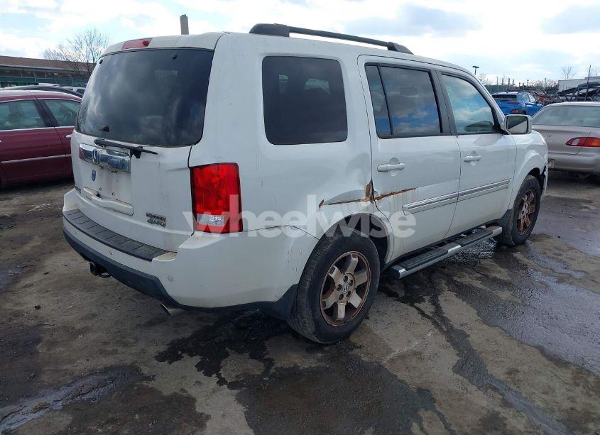 Photo 4 of 2011 Honda Pilot TOURING (VIN 5FNYF4H92BB037647)
