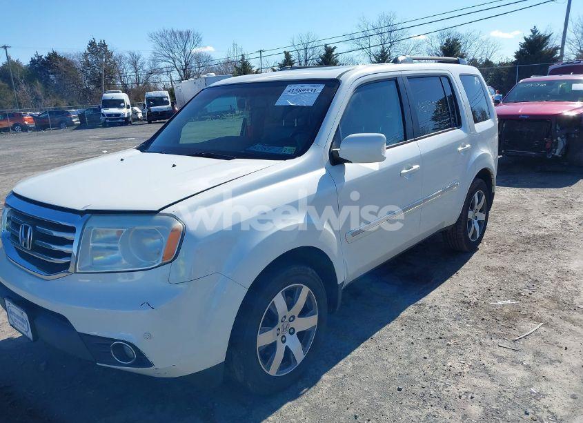 Photo 2 of 2014 Honda Pilot TOURING (VIN 5FNYF4H92EB044666)