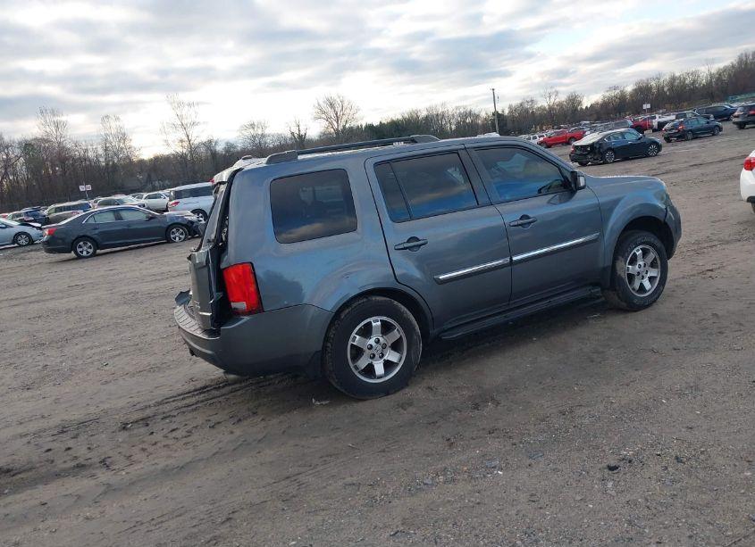 Photo 4 of 2011 Honda Pilot TOURING (VIN 5FNYF4H93BB064226)