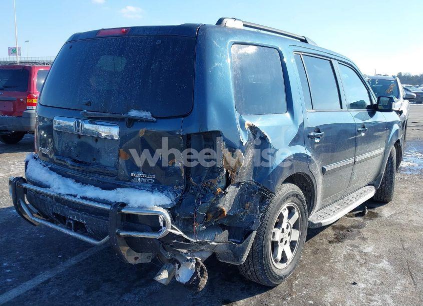 Photo 4 of 2011 Honda Pilot TOURING (VIN 5FNYF4H95BB048433)