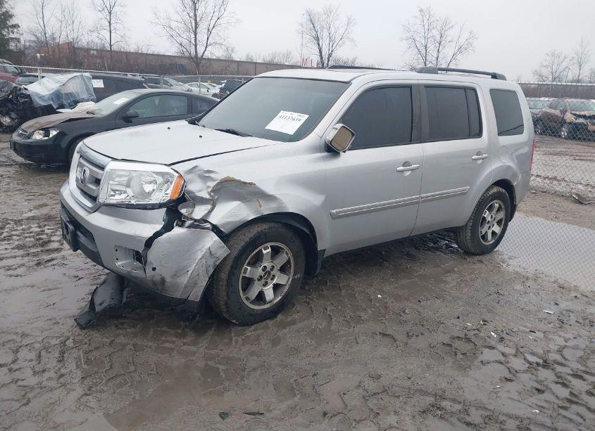 Photo 2 of 2011 Honda Pilot TOURING (VIN 5FNYF4H95BB062641)