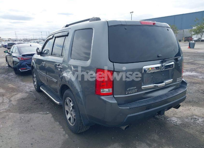 Photo 3 of 2011 Honda Pilot TOURING (VIN 5FNYF4H95BB067399)