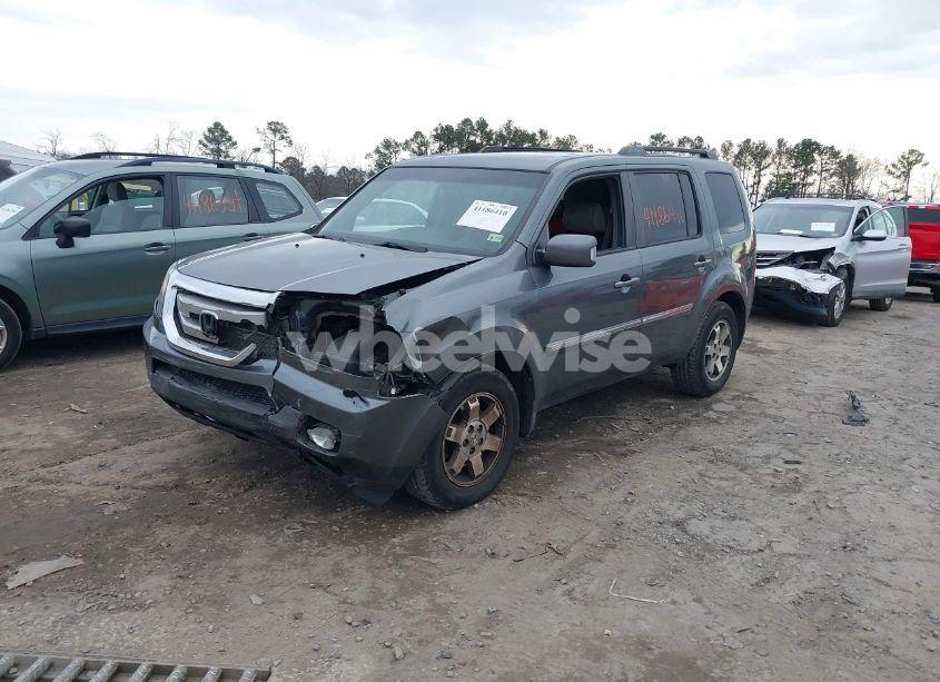 Photo 2 of 2011 Honda Pilot TOURING (VIN 5FNYF4H97BB007673)