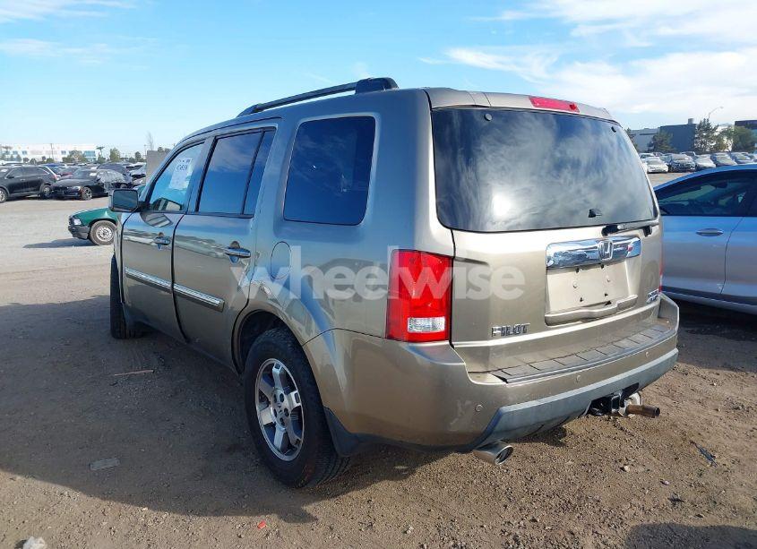 Photo 3 of 2011 Honda Pilot TOURING (VIN 5FNYF4H97BB102184)