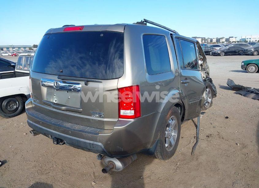 Photo 4 of 2011 Honda Pilot TOURING (VIN 5FNYF4H97BB102184)