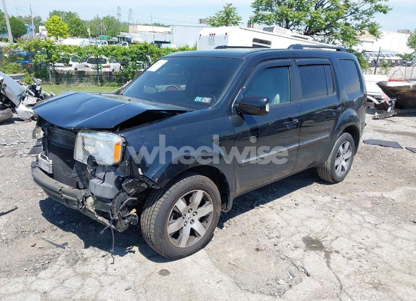 Photo 2 of 2013 Honda Pilot TOURING (VIN 5FNYF4H97DB052793)