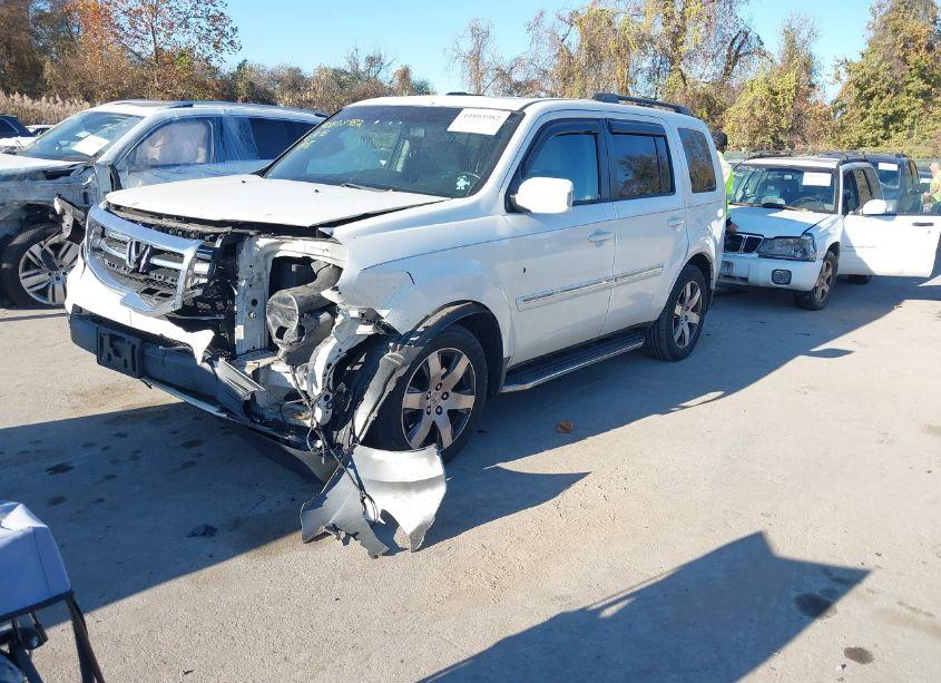 Photo 2 of 2014 Honda Pilot TOURING (VIN 5FNYF4H97EB036630)