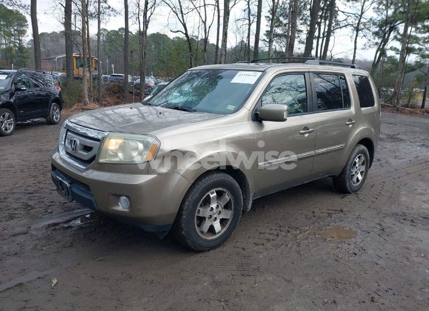 Photo 2 of 2011 Honda Pilot TOURING (VIN 5FNYF4H98BB061922)