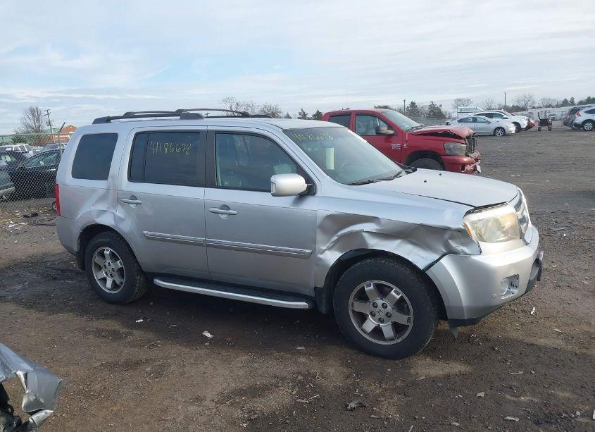 Photo 13 of 2011 Honda Pilot TOURING (VIN 5FNYF4H98BB093947)