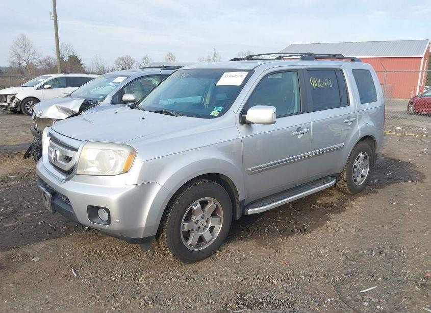 Photo 2 of 2011 Honda Pilot TOURING (VIN 5FNYF4H98BB093947)
