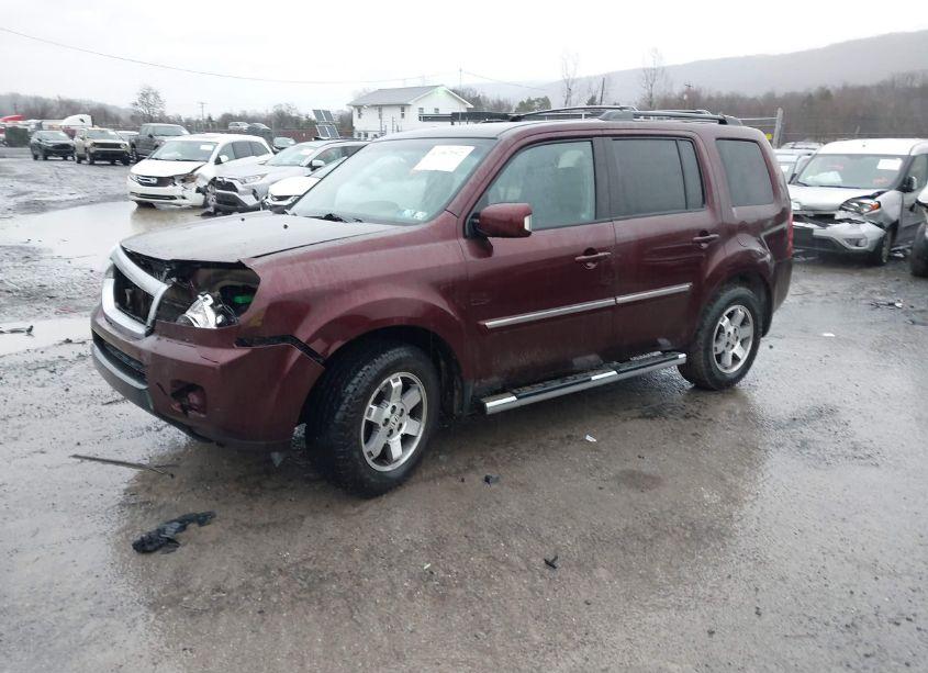 Photo 2 of 2011 Honda Pilot TOURING (VIN 5FNYF4H99BB092743)