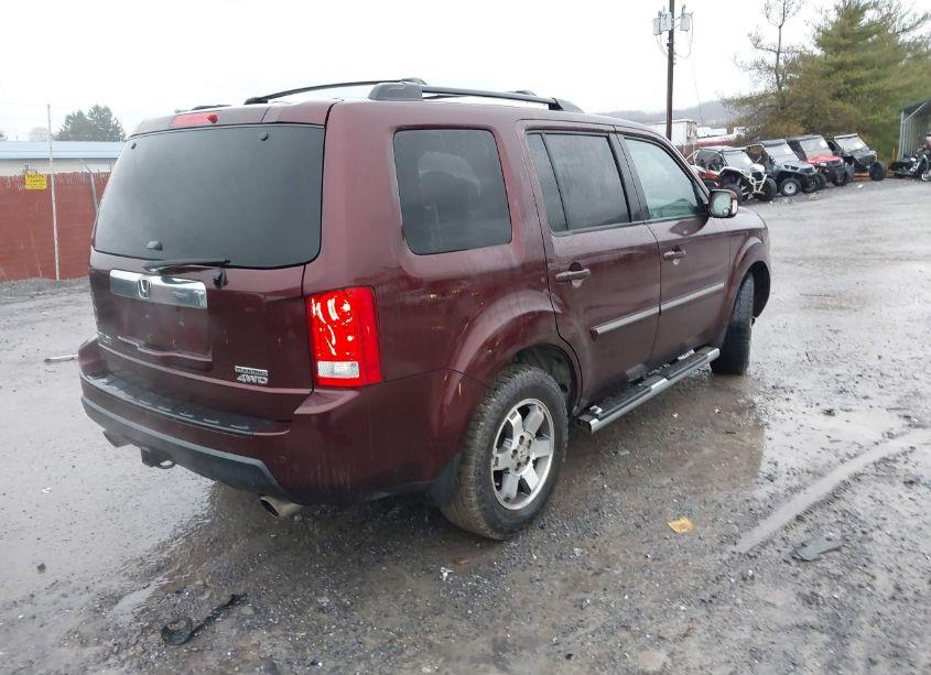 Photo 4 of 2011 Honda Pilot TOURING (VIN 5FNYF4H99BB092743)