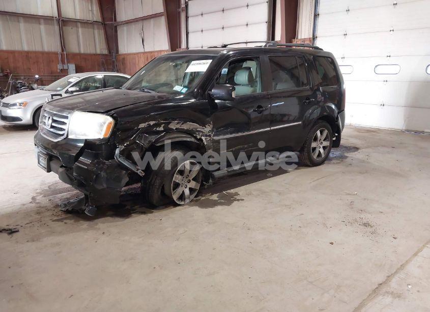 Photo 2 of 2012 Honda Pilot TOURING (VIN 5FNYF4H99CB055287)