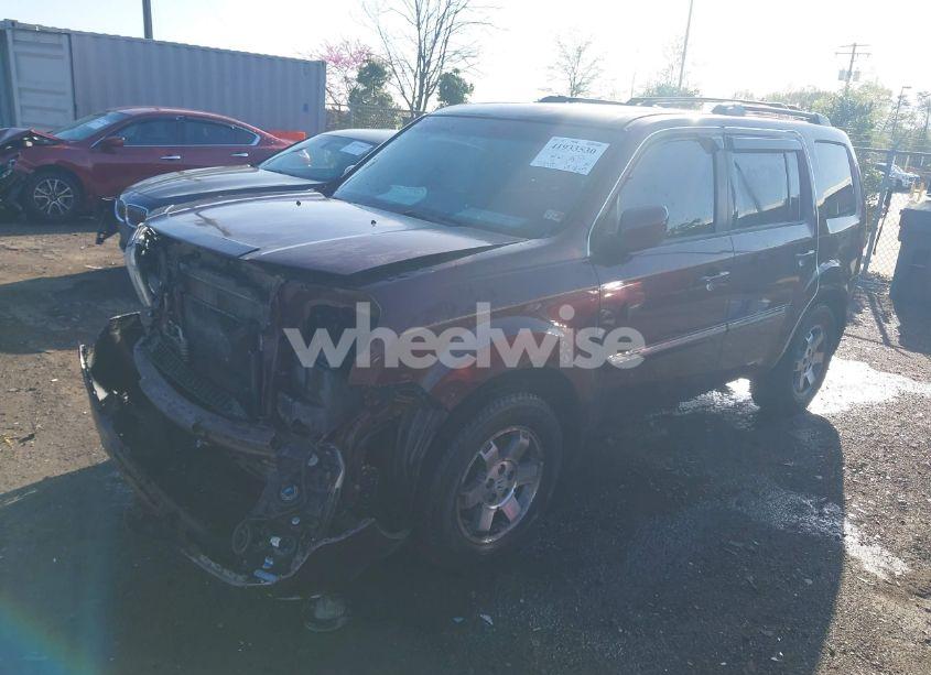 Photo 2 of 2011 Honda Pilot TOURING (VIN 5FNYF4H9XBB040893)