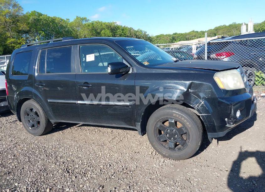 Photo 12 of 2011 Honda Pilot TOURING (VIN 5FNYF4H9XBB070931)