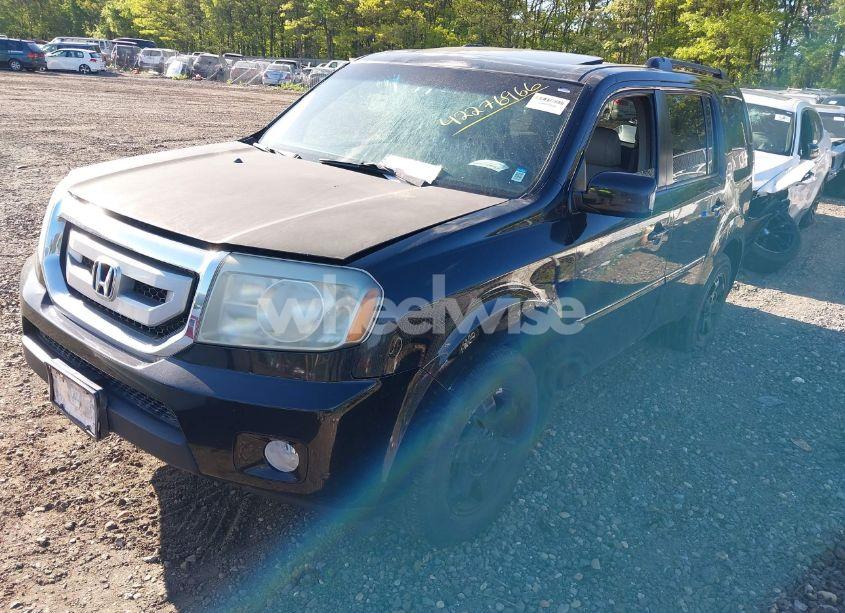 Photo 2 of 2011 Honda Pilot TOURING (VIN 5FNYF4H9XBB070931)