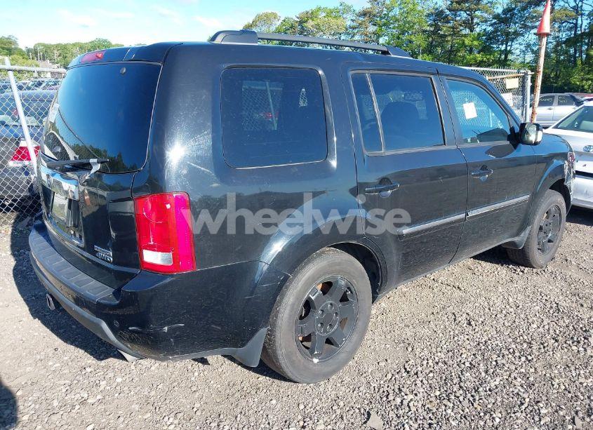 Photo 4 of 2011 Honda Pilot TOURING (VIN 5FNYF4H9XBB070931)