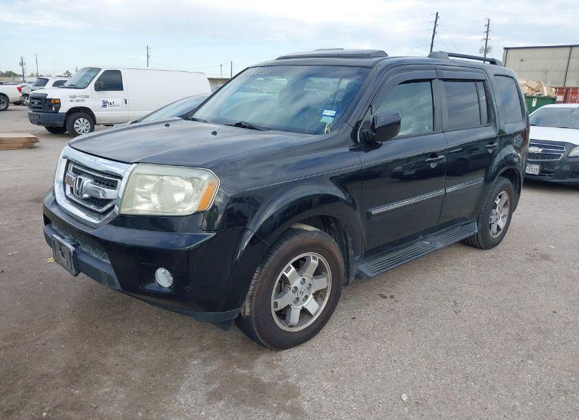 Photo 2 of 2011 Honda Pilot TOURING (VIN 5FNYF4H9XBB075840)