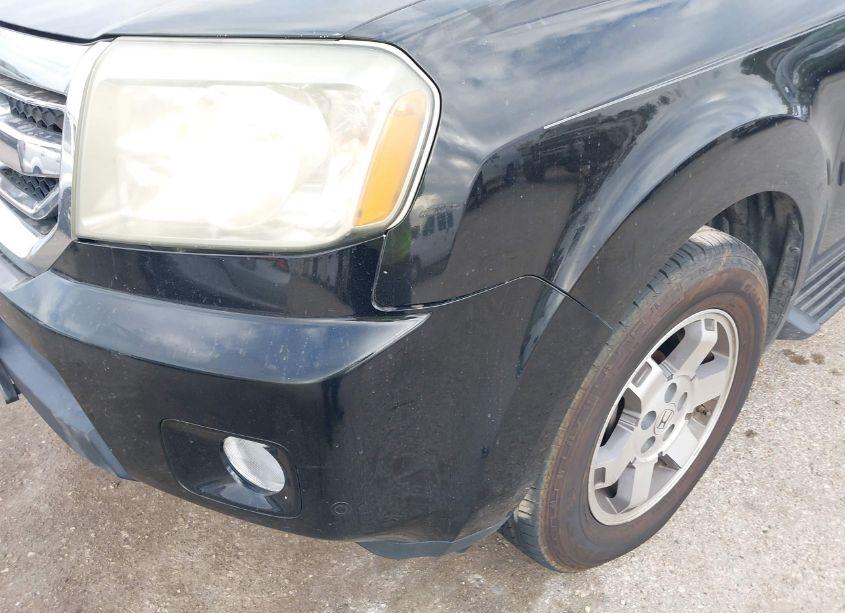 Photo 20 of 2011 Honda Pilot TOURING (VIN 5FNYF4H9XBB075840)